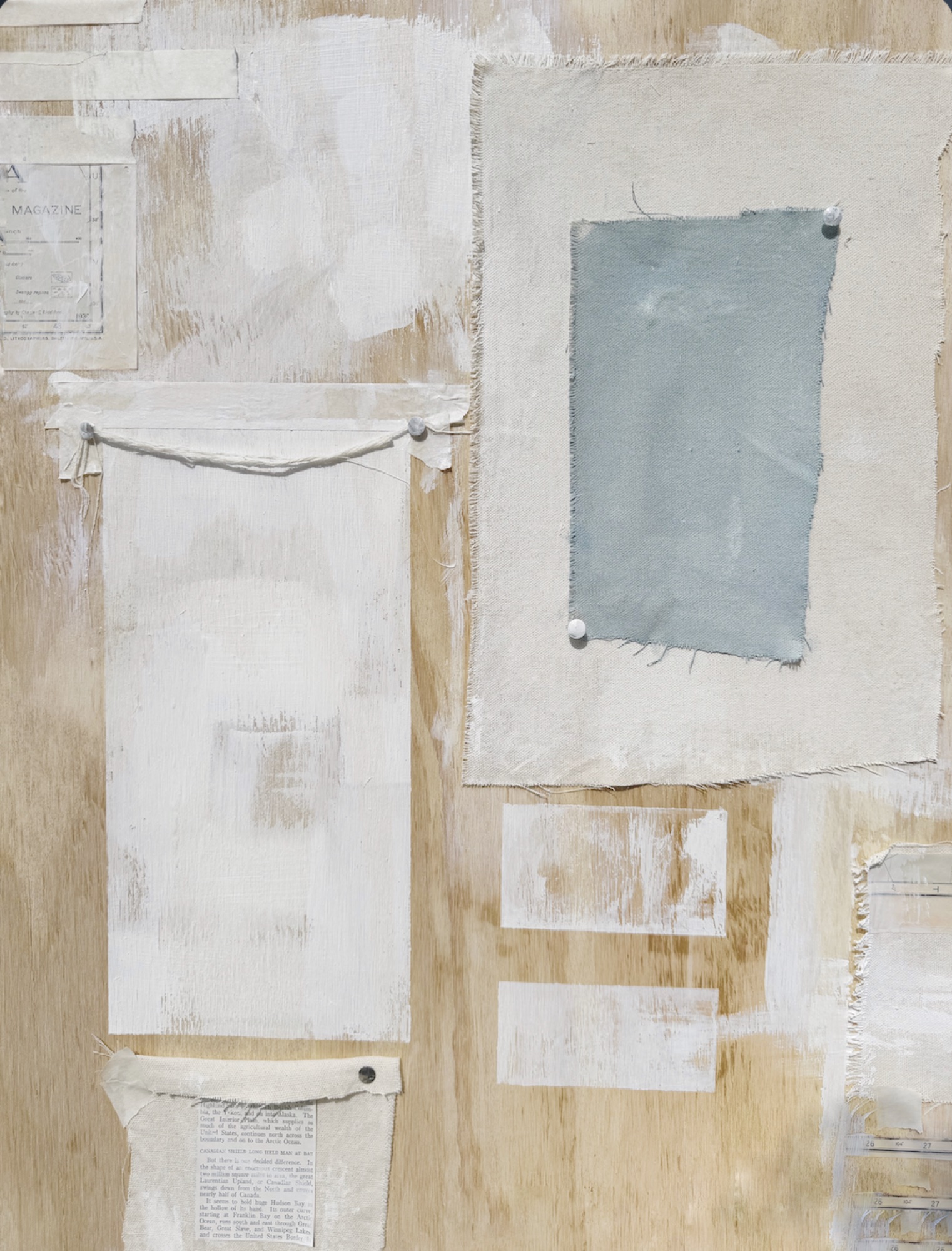 Cream ground with a pale blue panel and pinned sheets of paper.