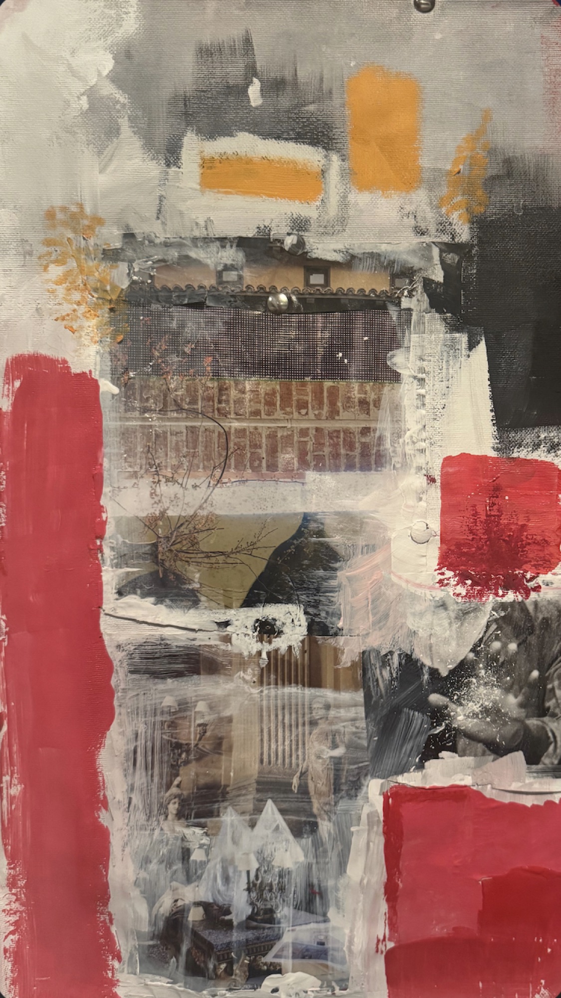 Vertical abstract in red, black and orange blocks.